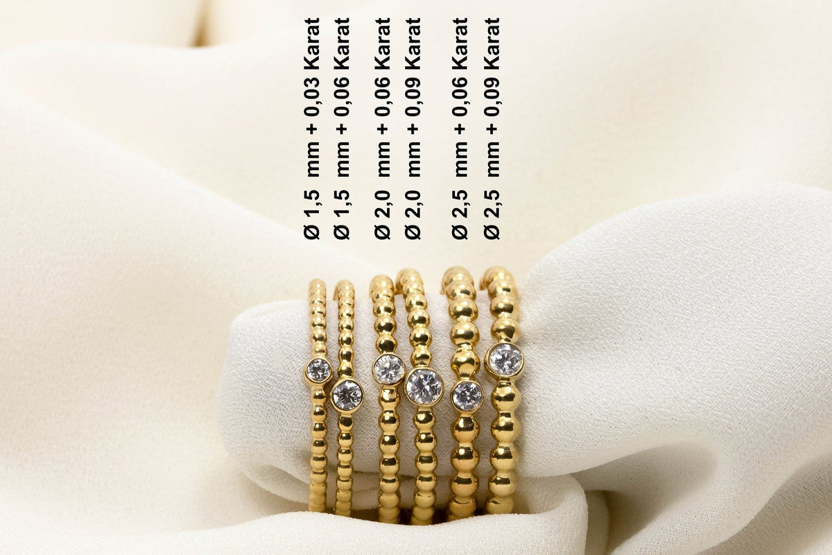 Kugelring mit Brillant aus 585 Gelbgold