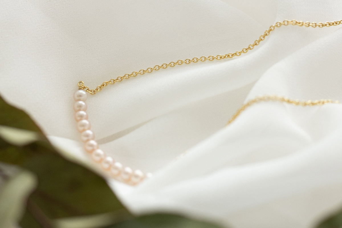 Perlenkette aus 585 Gelbgold mit zart rosé farbenen Perlen