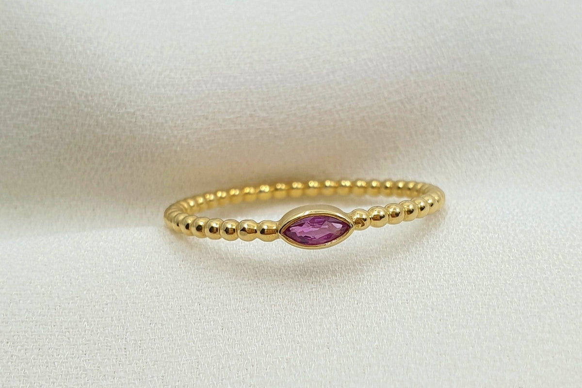 Kugelring aus 585 Gelbgold mit Edelstein in Navette-Form