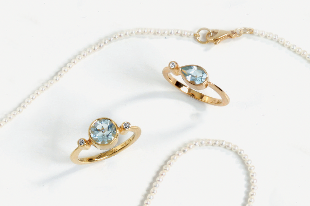 Eleganter Ring mit Aquamarin im Tropfenschliff und Brillant