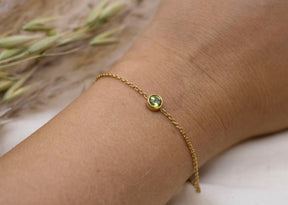 Filigranes Goldarmband in 585 Gelbgold mit einem runden Peridot oder Blau Topas Edelstein