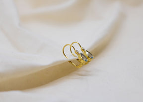 Zarte Goldohrringe aus 585 Gelbgold mit Brillanten und Blau Topas
