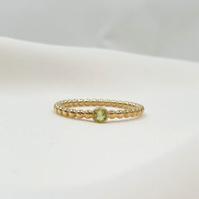 Kugelring 2 mm aus 585 Gelbgold mit Peridot