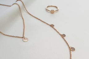 Halskette mit Plättchen Anhängern 585 Rosegold Kette mit 7 runden Scheiben besondere Plättchenkette Münzkette