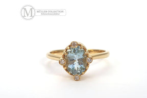 Glamouröser Goldring Blau Topas, 14 Karat 585 Echtgoldring, 4 Brillanten 0.05 ct,  Art Nouveau, Jugendstilring, Verlobungsring, Gelbgold